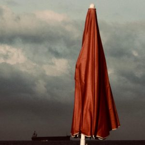 “The Red Parasol” - Photograph, archival pigment print on archival Hahne Muhle paper, 34 x 48,5 cm,  Edition: 1/10, 2025